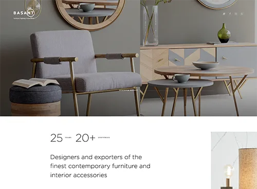 Modern living room setup with a gray armchair, geometric-patterned sideboard, round mirror, and minimalist coffee tables.