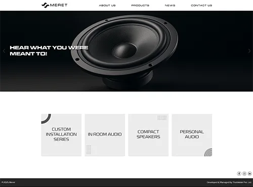 Website homepage featuring a large speaker image and product categories: custom installation, in-room audio, compact speakers, and personal audio.
